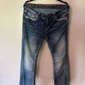 Rock Revival Blue Boot Cut Jeans with Distressed Finish